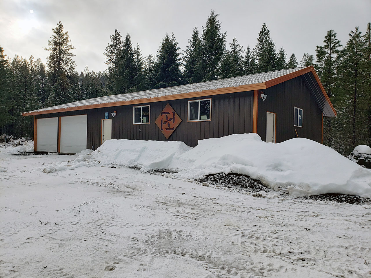 Post frame building standing up to winter snow in the Inland Northwest